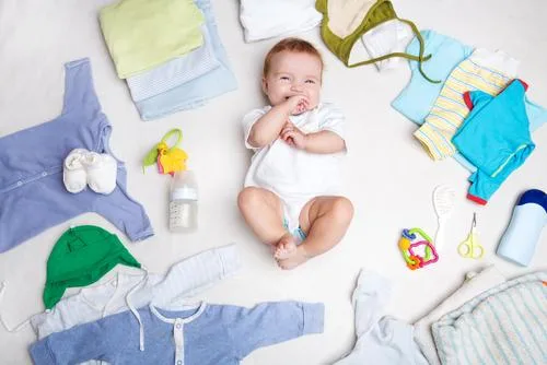 Baby on white background with clothing 1